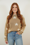 Front view - brown hair model in tan star print knit sweater